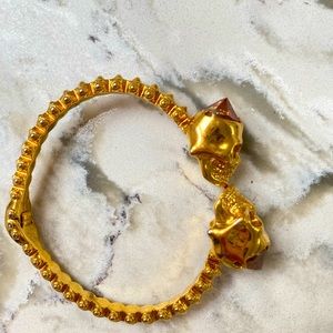 McQueen gold skull cuff